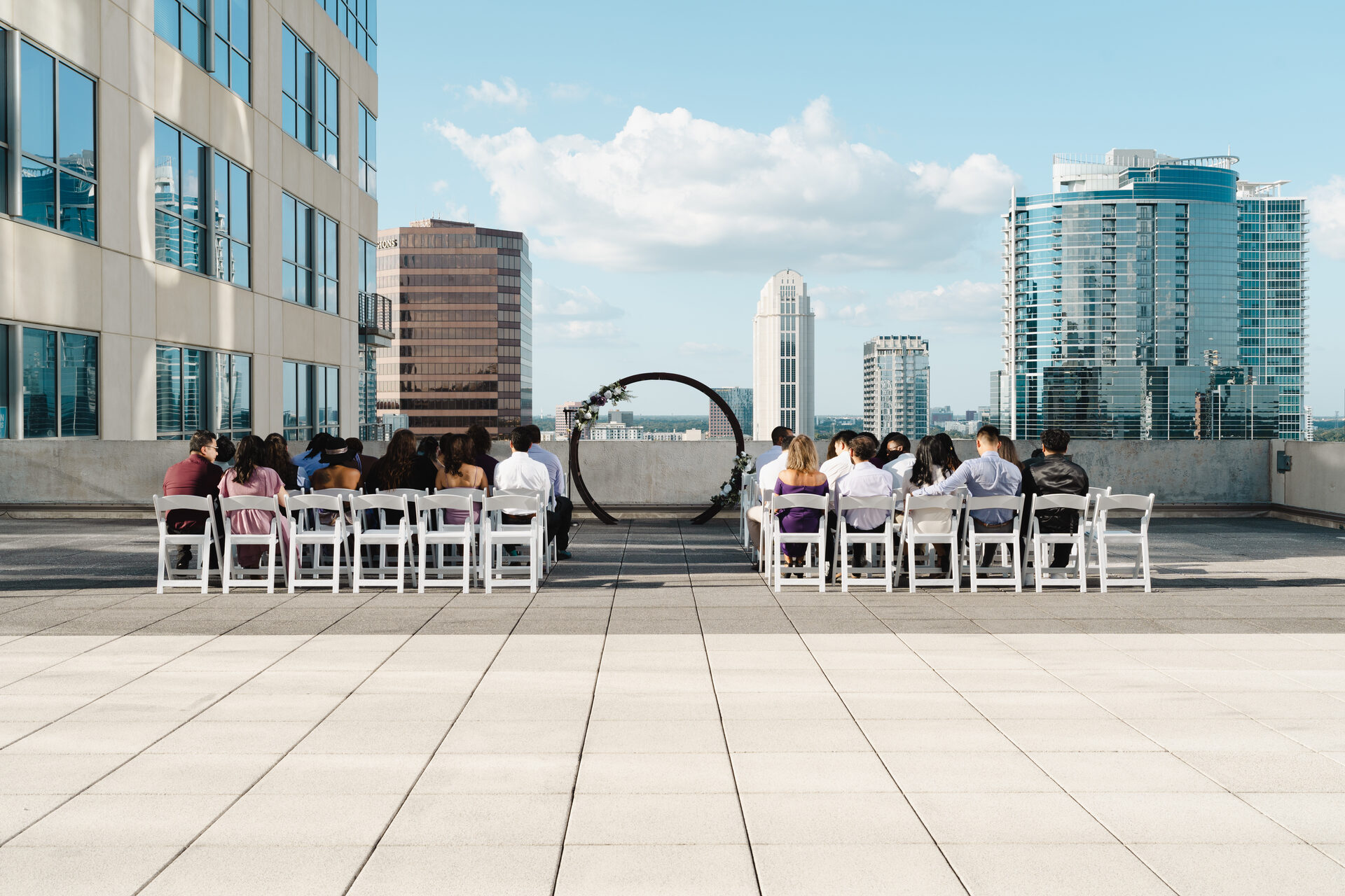 Wedding photographer New York City — rooftop ceremony, skyline backdrop